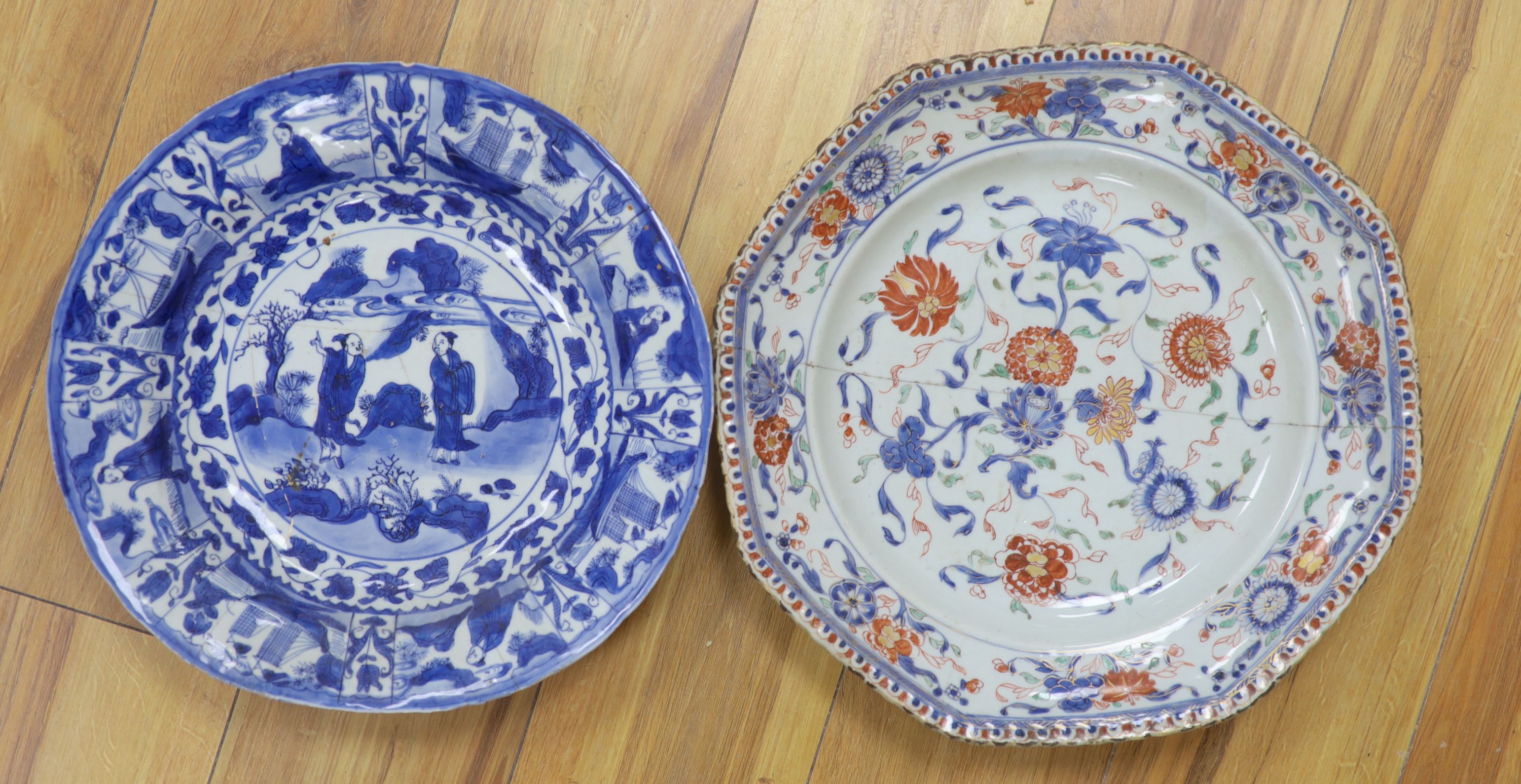 A Chinese Ming kraak blue and white dish, c.1640, together with a Kangxi Imari dish, c.1715, largest diameter 39cm